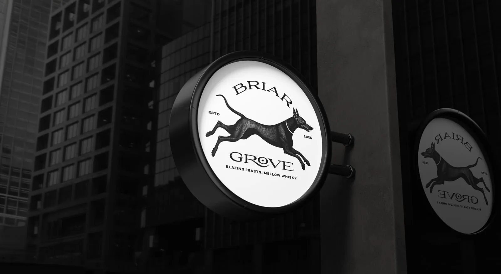 Briar Grove illuminated sign at night