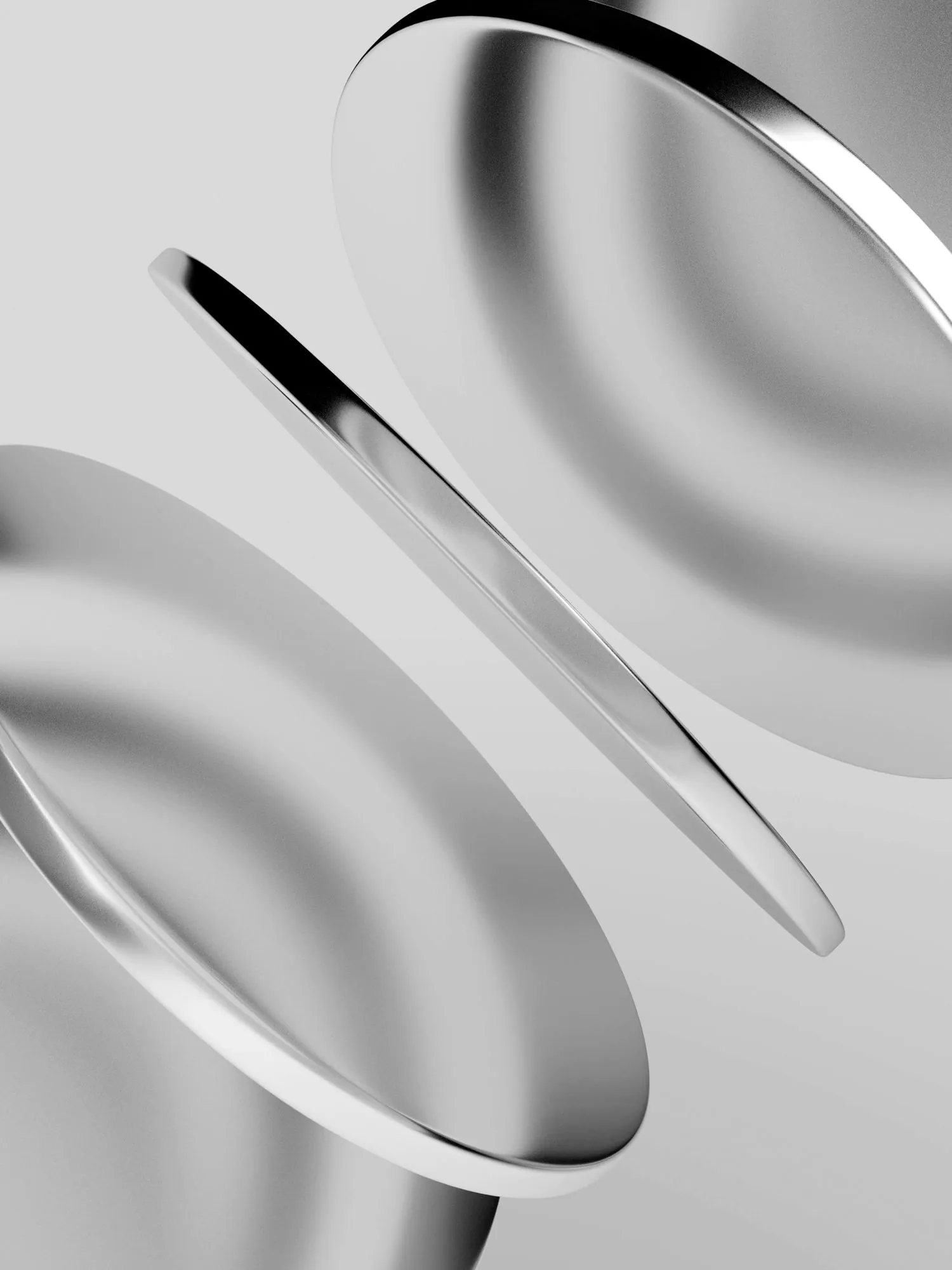 Polished metal discs suspended in space